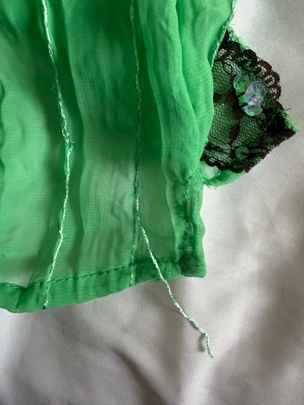Vintage Y2K green sequin cami with brown lace detail and straps