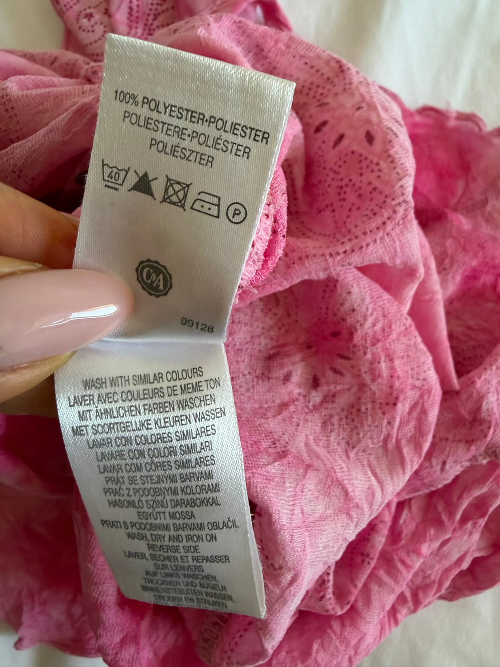 Vintage pink knot bust cami with floral print and sparkly detail and lettuce hem