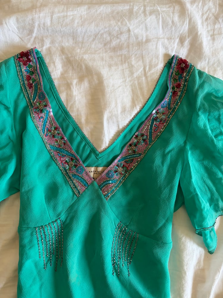 Vintage Y2K 2004 Karen Millen aqua blue silk embellished asymmetrical hem top
