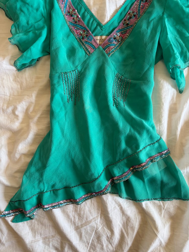 Vintage Y2K 2004 Karen Millen aqua blue silk embellished asymmetrical hem top