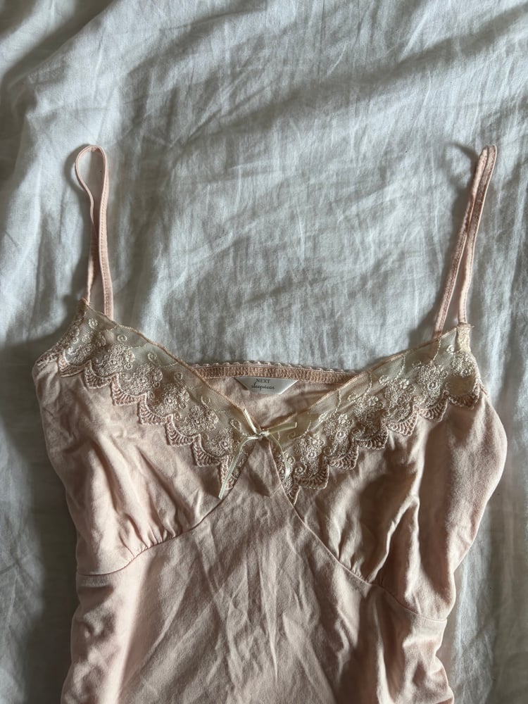 Vintage Y2K baby cami with mesh bust detail and ribbon bow