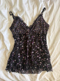 Vintage Y2K black floral cami with ruffle bust detail and ribbon