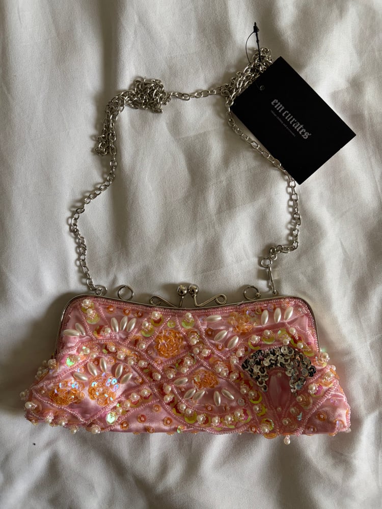 Vintage 1990s baby pink beaded and sequin bagComes with silver chain which is removable