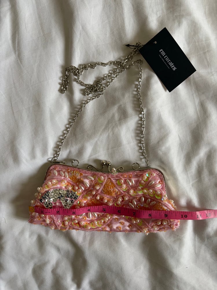 Vintage 1990s baby pink beaded and sequin bagComes with silver chain which is removable