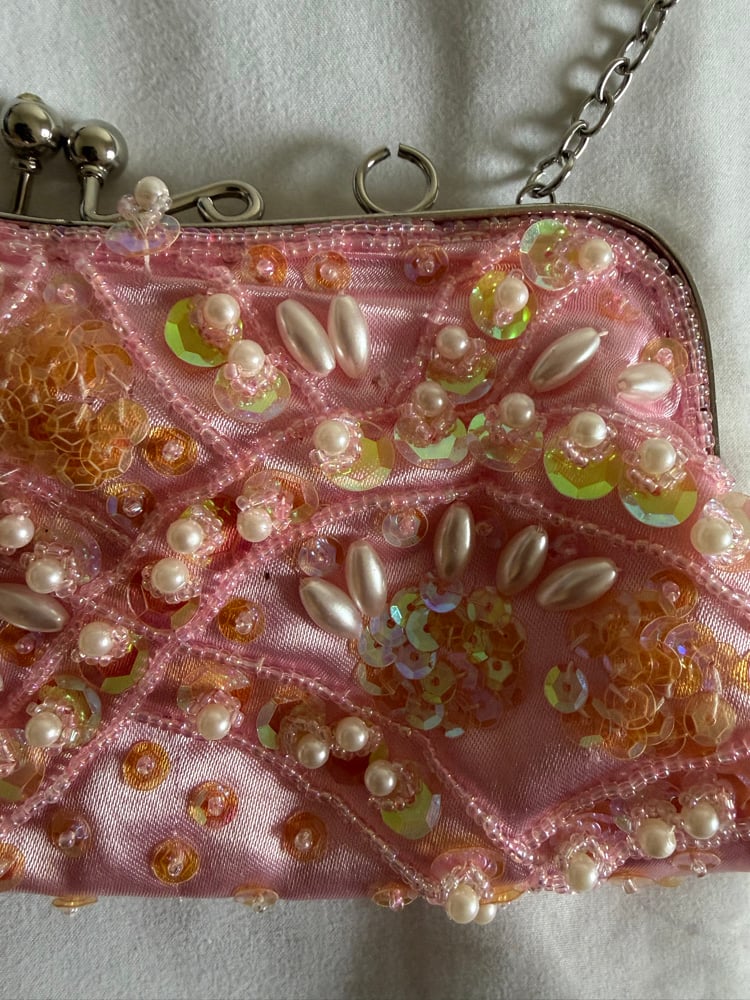Vintage 1990s baby pink beaded and sequin bagComes with silver chain which is removable