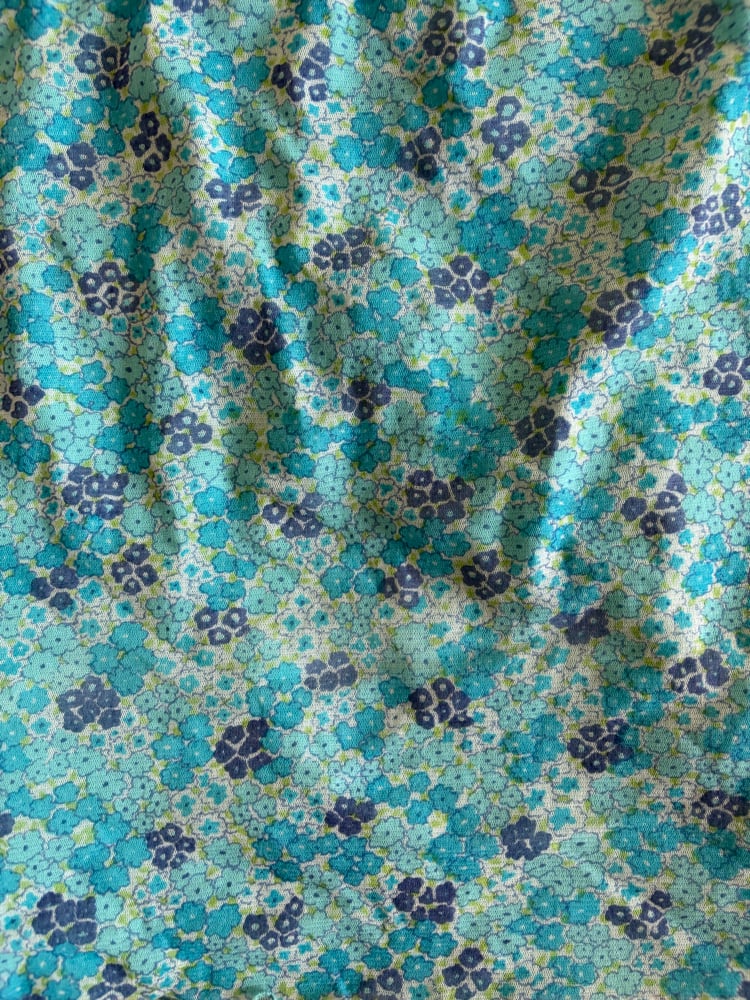 Vintage 1990s blue floral ditsy mesh midi skirt with lettuce hem