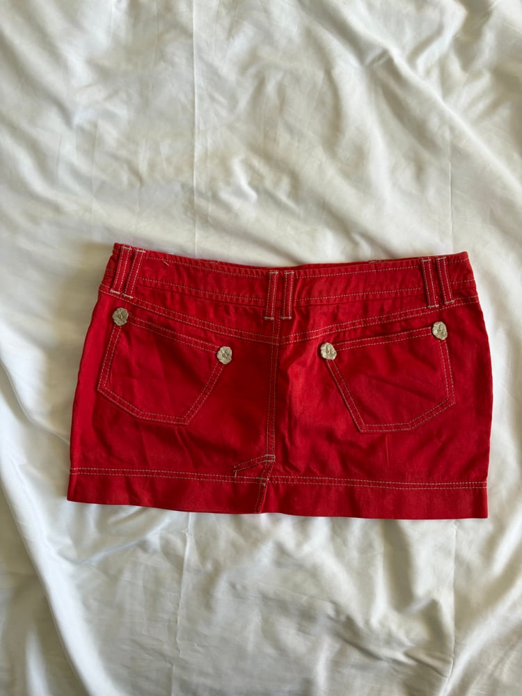 Vintage Y2K red denim belt skirt with white stitching and floral hardware