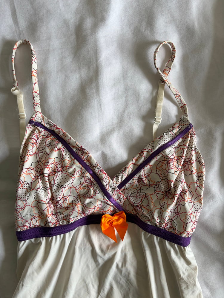 Vintage Y2K slip mini dress with orange and purple detailing and ruffle hem