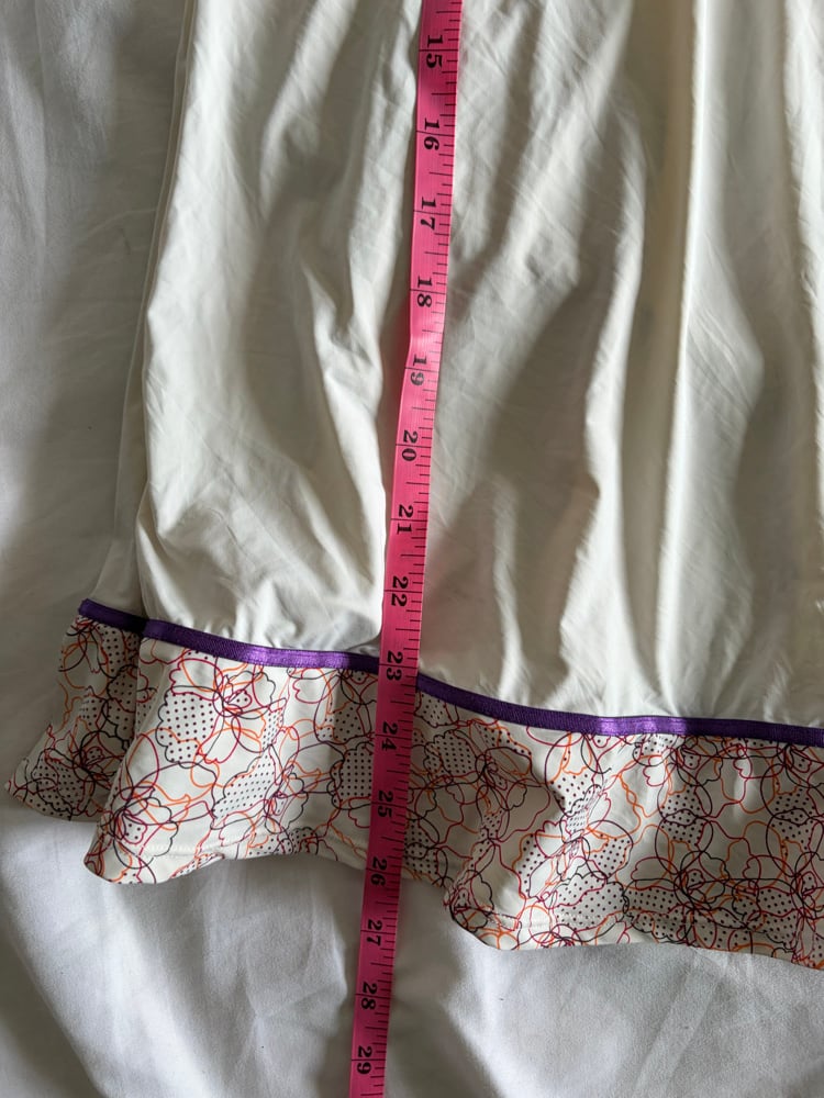 Vintage Y2K slip mini dress with orange and purple detailing and ruffle hem