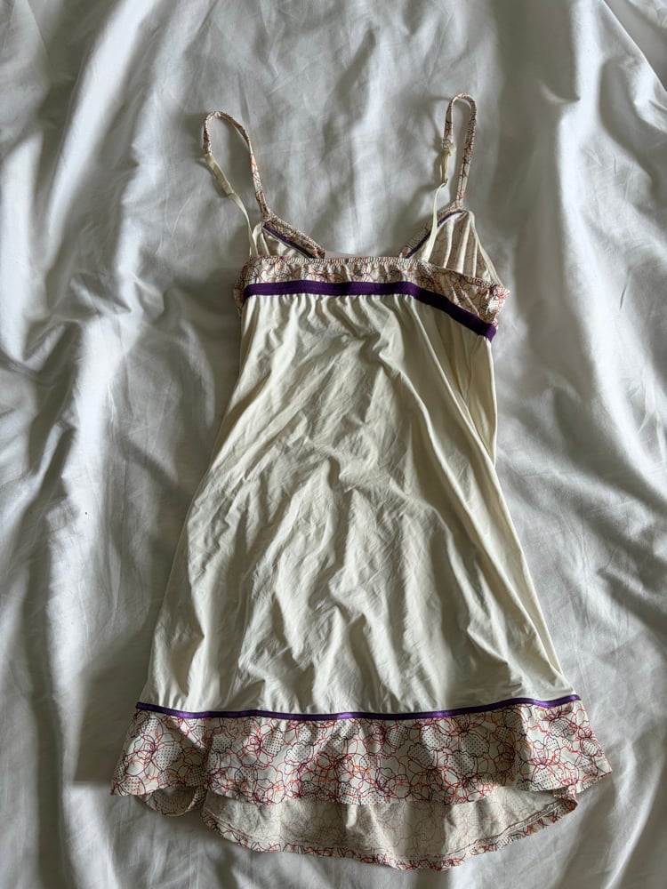 Vintage Y2K slip mini dress with orange and purple detailing and ruffle hem