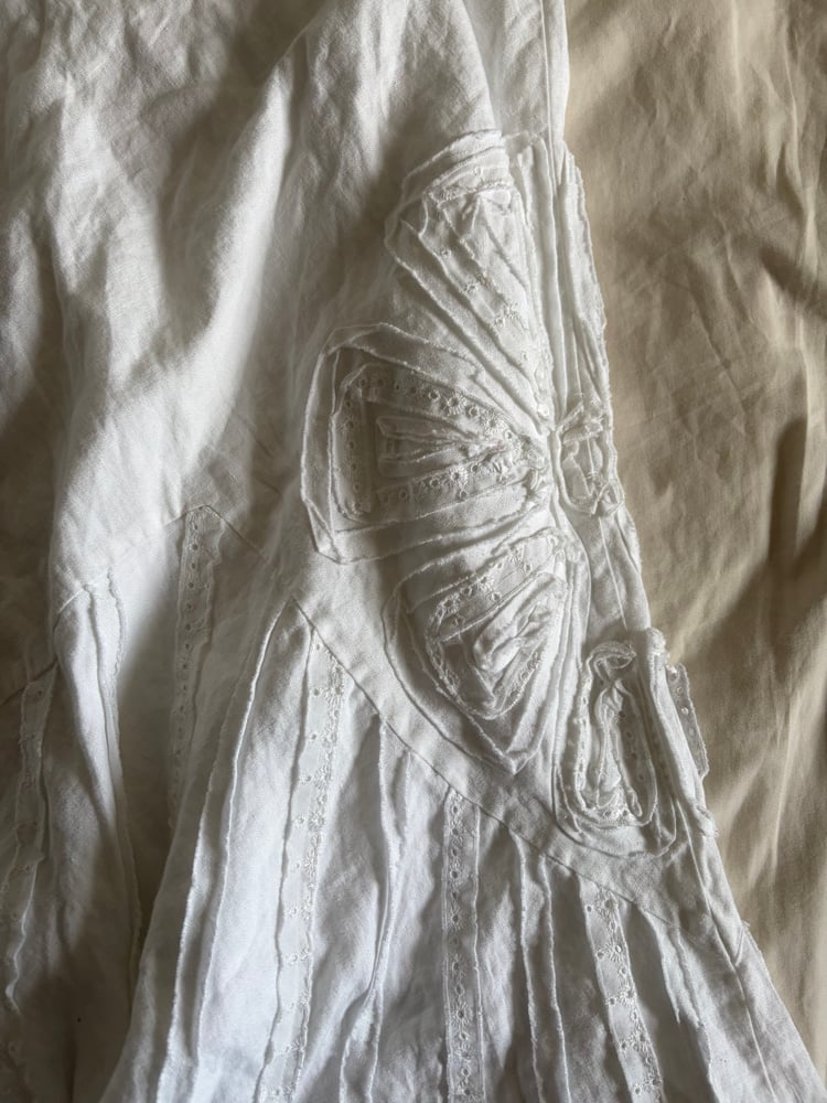 Vintage Y2K white asymmetrical hem fairy skirt with embroidery detail